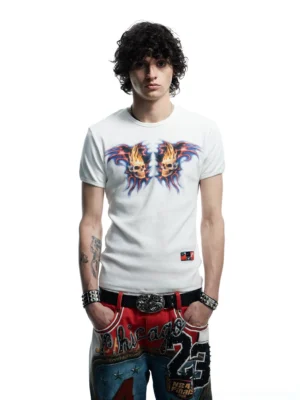 Front full-body view of a white flaming skull graphic fitted baby tee with symmetrical fiery chest print and slim crew neck