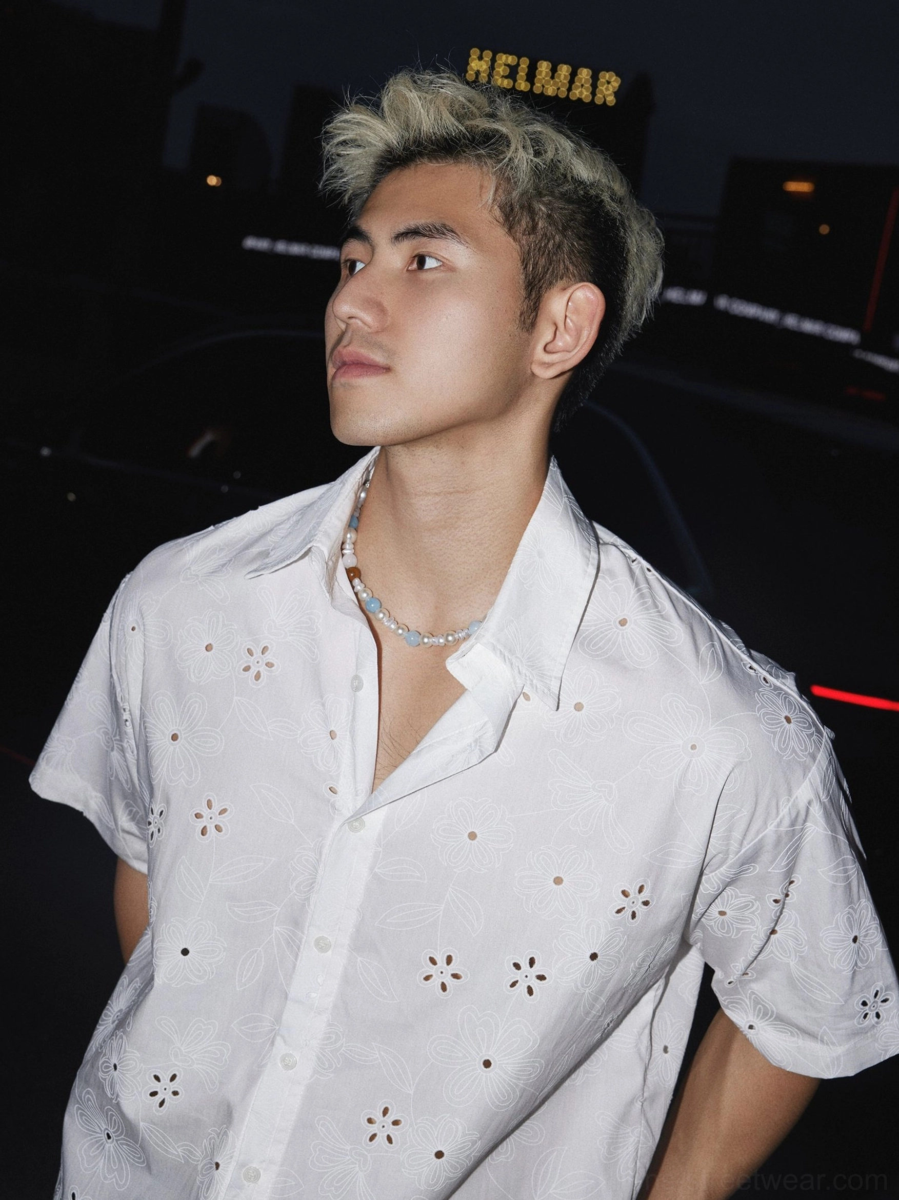 White floral eyelet short sleeve shirt side detail showing floral cutouts and relaxed Korean fashion styling