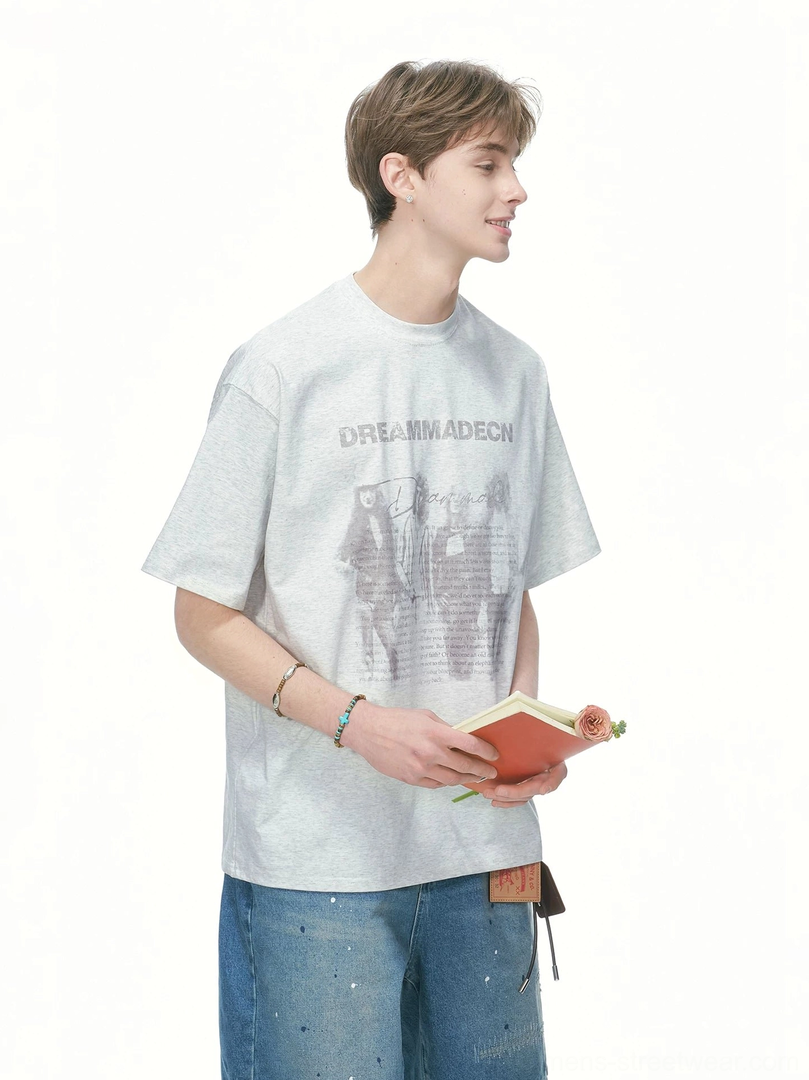 White Flower Gray oversized graphic crew neck T-shirt styled with paint splatter denim shorts and a leather belt