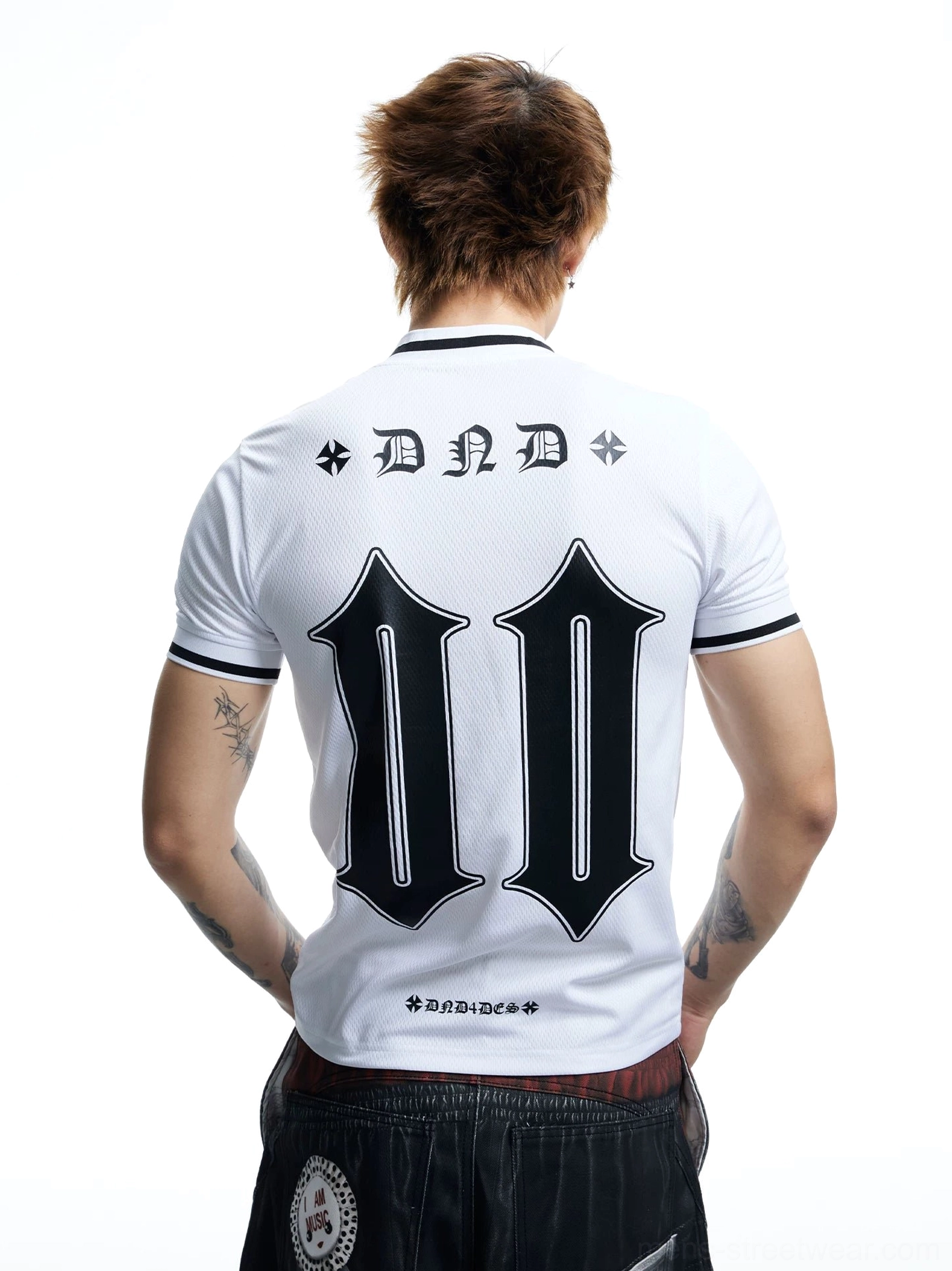 Back view of a white football jersey T-shirt with oversized black number 00 graphic, DND lettering, decorative marks, and contrast collar and sleeve cuffs