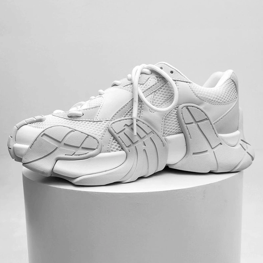 Pure white futuristic chunky platform sneaker displayed in a minimalist studio, breathable mesh upper and heavy sculpted rubber sole