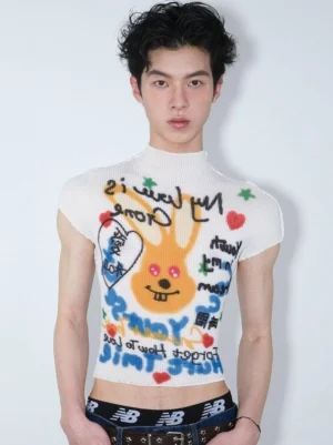 Close-up of white cropped mock neck T-shirt with colorful cartoon rabbit artwork handwritten graffiti lettering and Korean streetwear styling