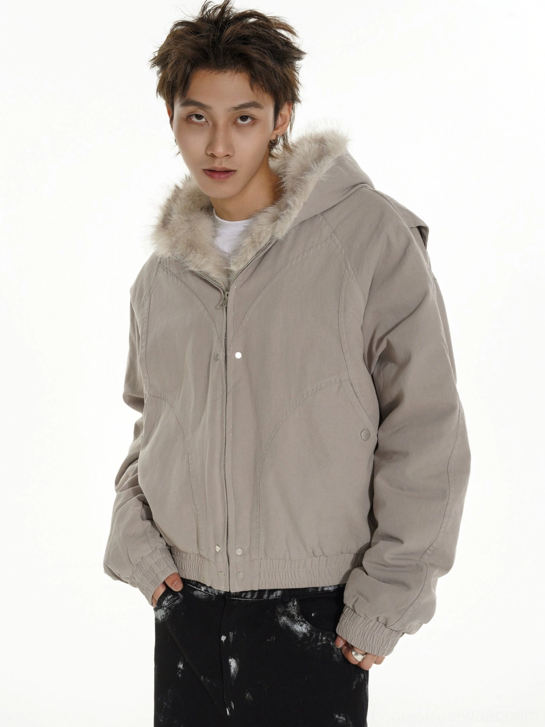 White gray faux fur lined hooded bomber jacket shown from the side with relaxed sleeves, elastic cuffs, and cropped hem