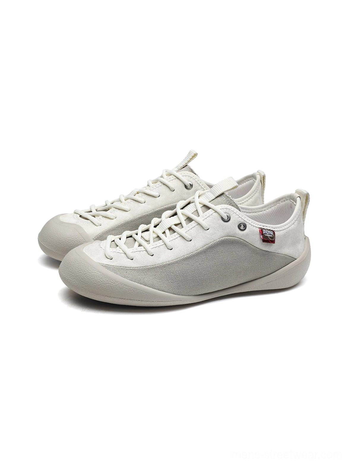 White gray ivory canvas and mesh streetwear sneakers with tonal overlays and a slim rubber sole for everyday urban styling