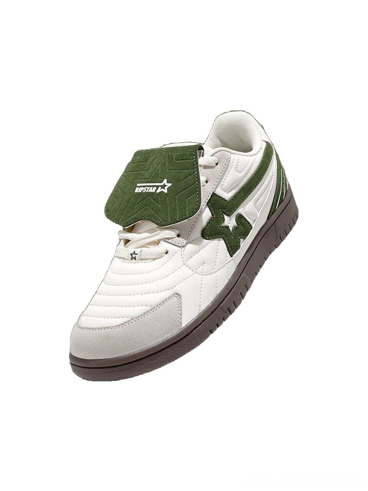 Detailed low angle view of a white green detachable tongue sneaker showing the star side panel layered suede and contrasting brown outsole