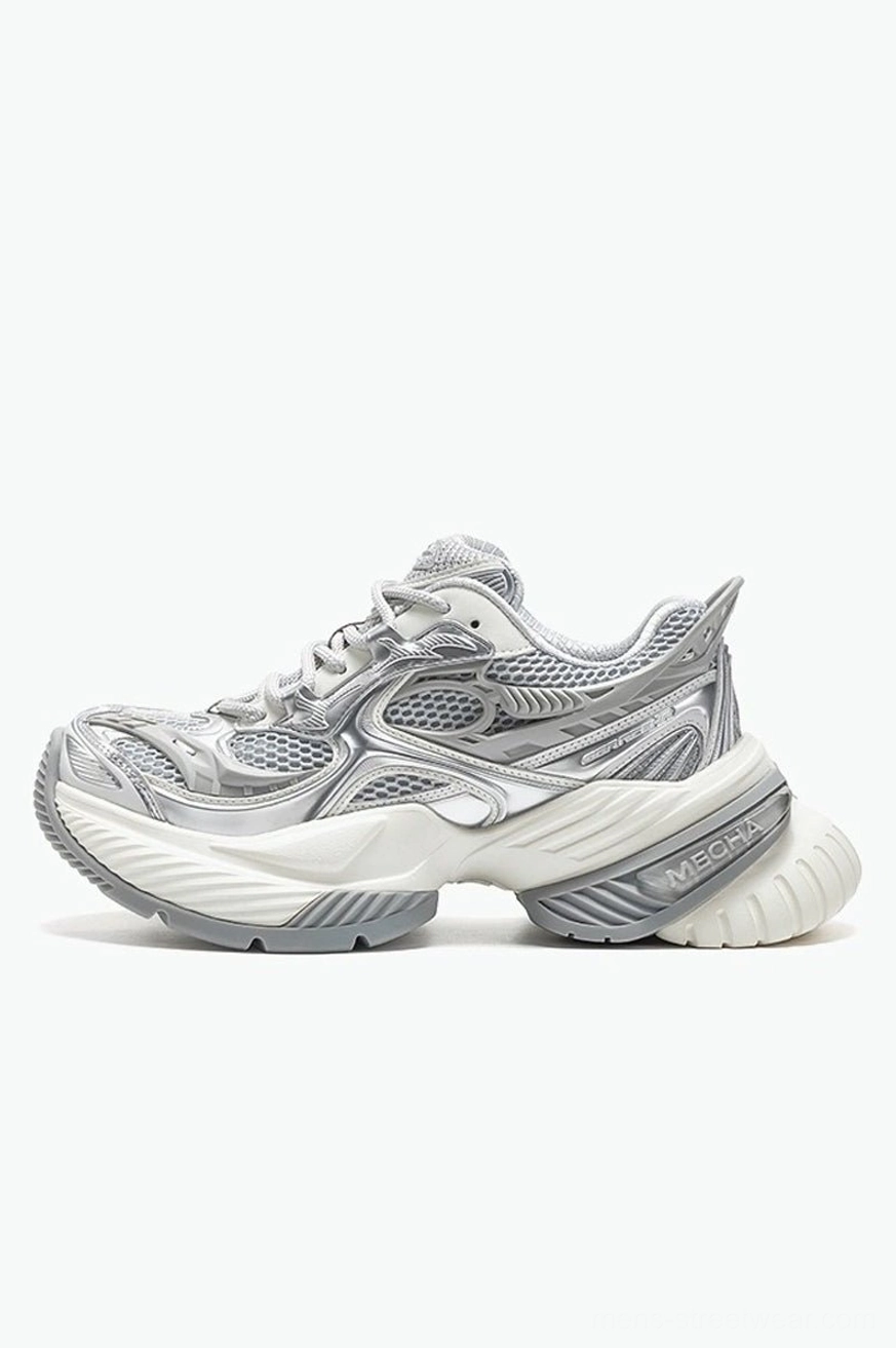 White and grey chunky mesh platform sneakers shown in left side profile with a dual-tone sculpted streetwear outsole