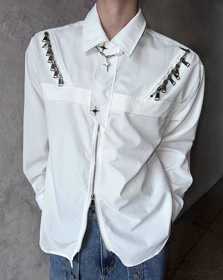 Front detail of white harness-inspired streetwear shirt jacket with clean curved hem and metal trims