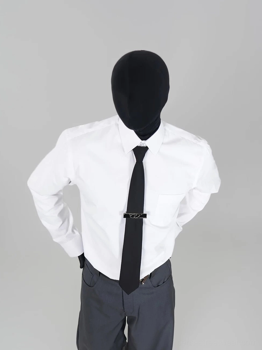 White Korean streetwear point-collar long-sleeve shirt styled with black necktie metal tie clip and tailored dark trousers