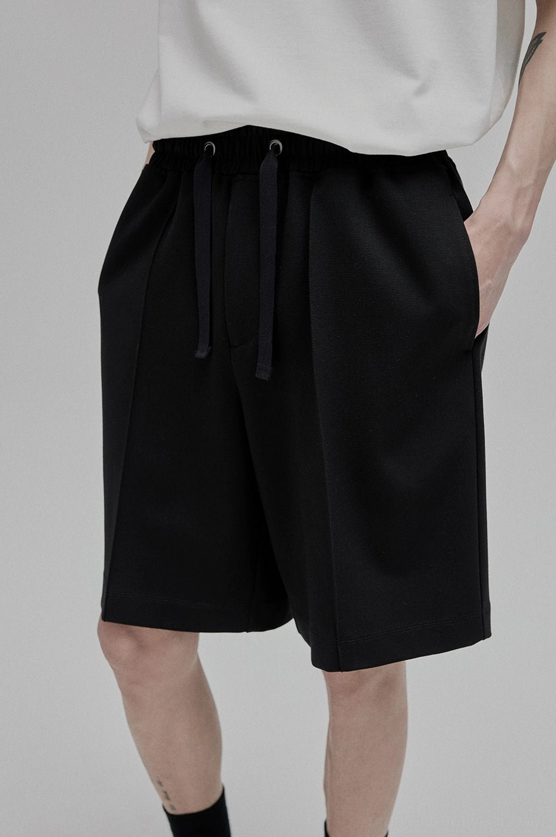 White lace-up straight leg shorts front waist drawstring dual drawstrings detail functional design