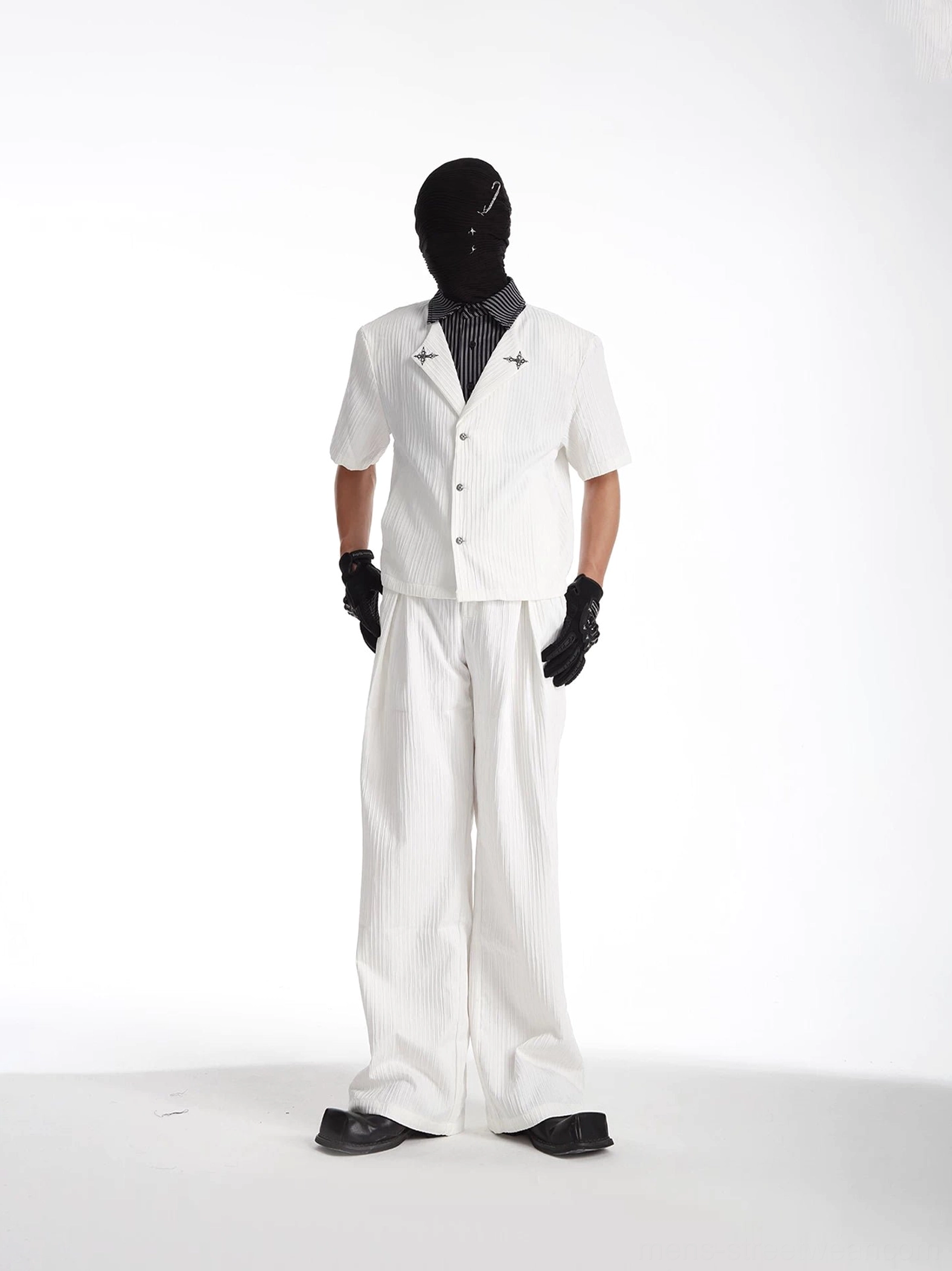 White two-piece Korean streetwear set with layered short-sleeve shirt and matching wide-leg tailored trousers