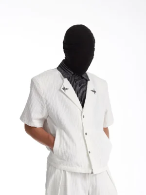 White layered short-sleeve Korean streetwear shirt with striped collar silver star embellishments and cropped relaxed fit