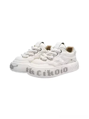 White leather wavy sole platform skate sneakers with layered panels, braided laces, chunky EVA rubber sole, and streetwear styling