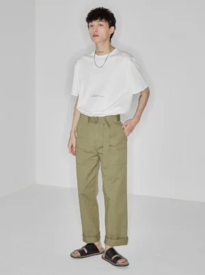 White minimalist letter print tee full body styling with khaki cargo pants and slide sandals casual streetwear outfit
