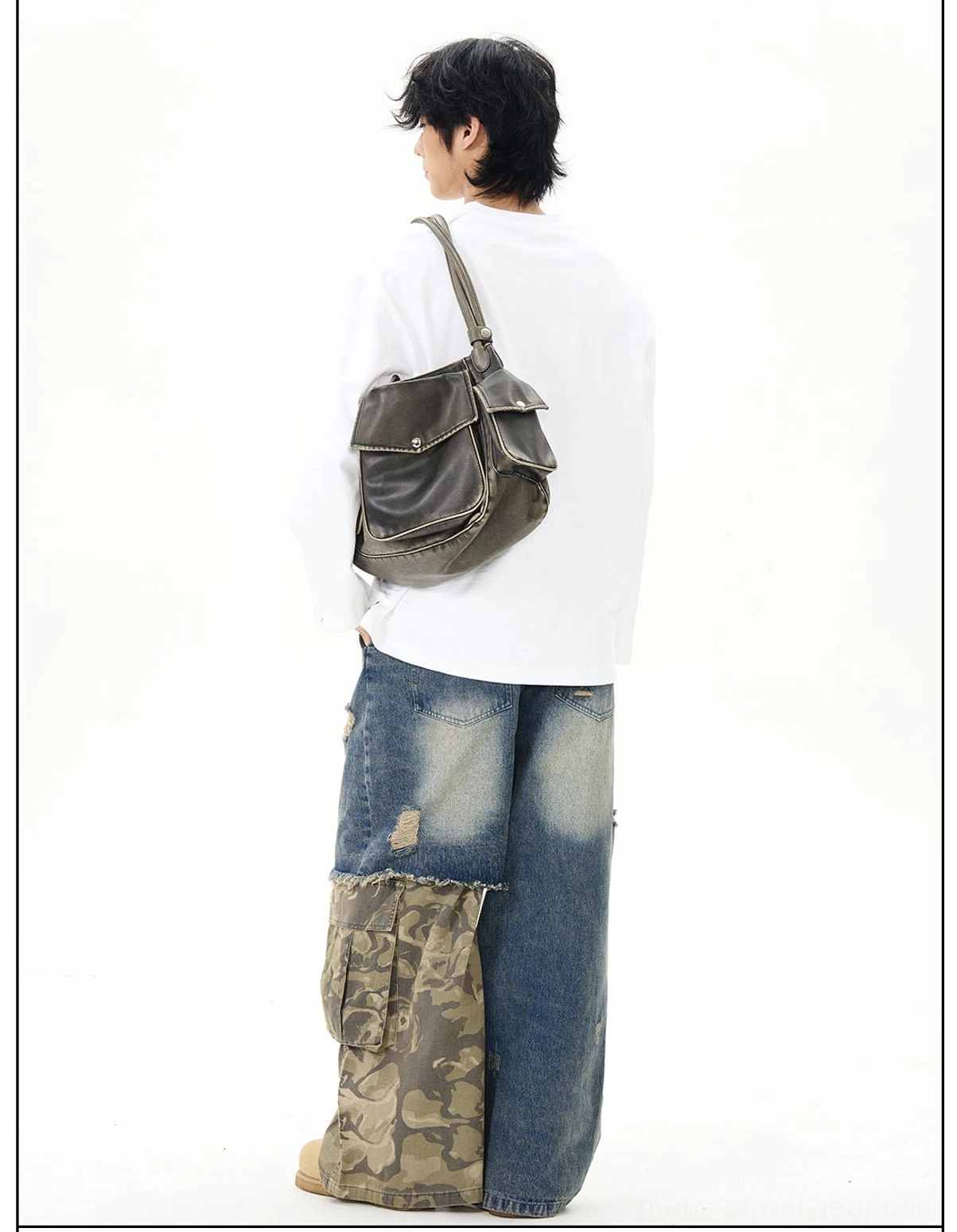 Full back view of a white long-sleeve cotton streetwear shirt with a clean solid design and relaxed oversized silhouette