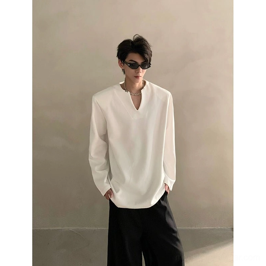 Long sleeve minimalist V-notch neck shirt in a clean white color with relaxed Korean streetwear proportions and modern neckline detailing