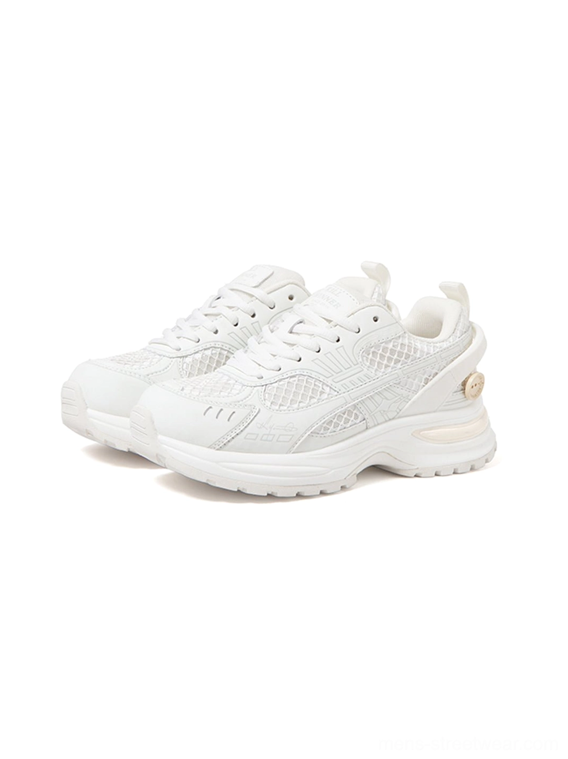 Pair of white mesh runner sneakers in a three-quarter front view with lace-up closure, tonal overlays, and chunky outsole