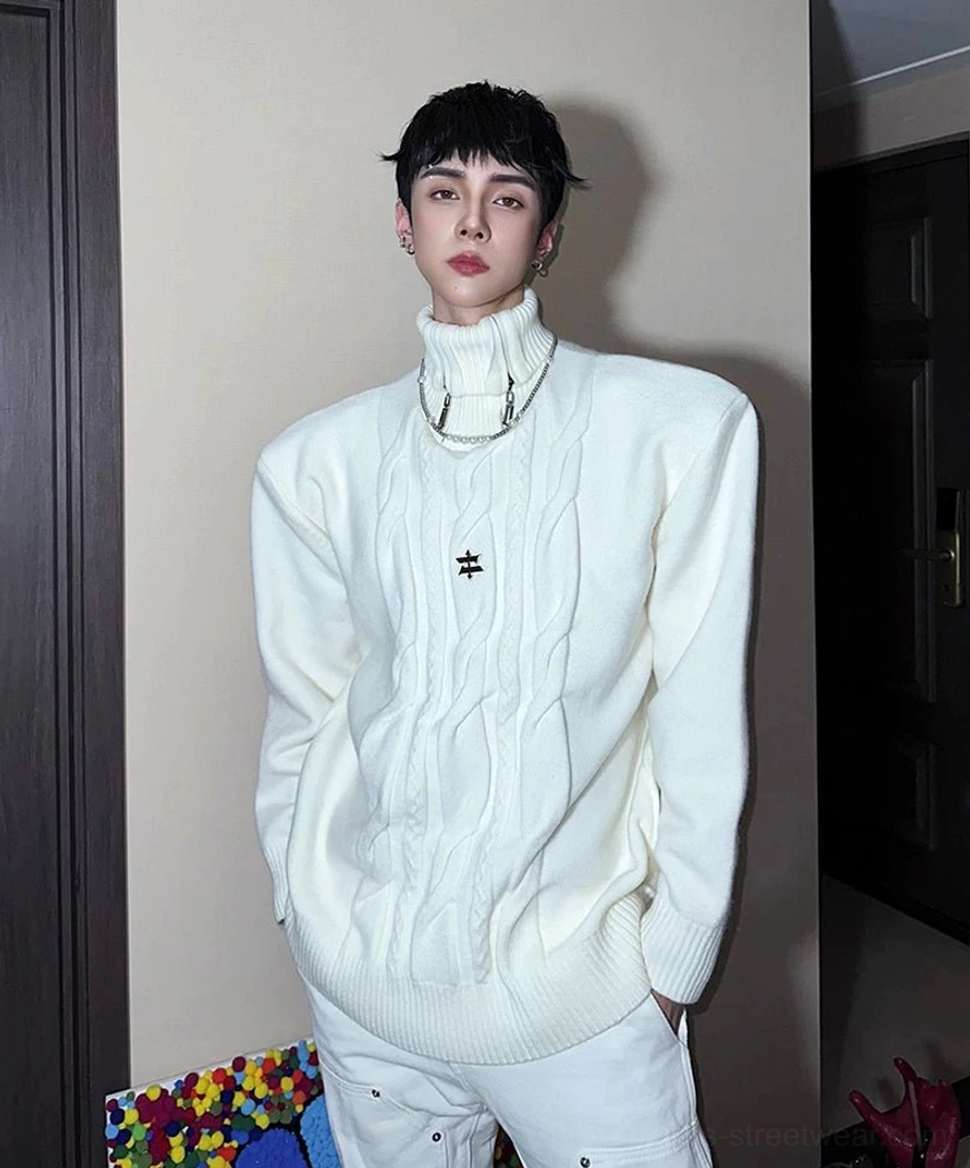 White oversized cable knit turtleneck sweater styled with white pants for a monochrome Seoul streetwear outfit