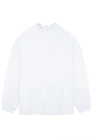 White oversized heavyweight 320 GSM cotton drop shoulder long sleeve streetwear t-shirt with crew neck and ribbed cuffs