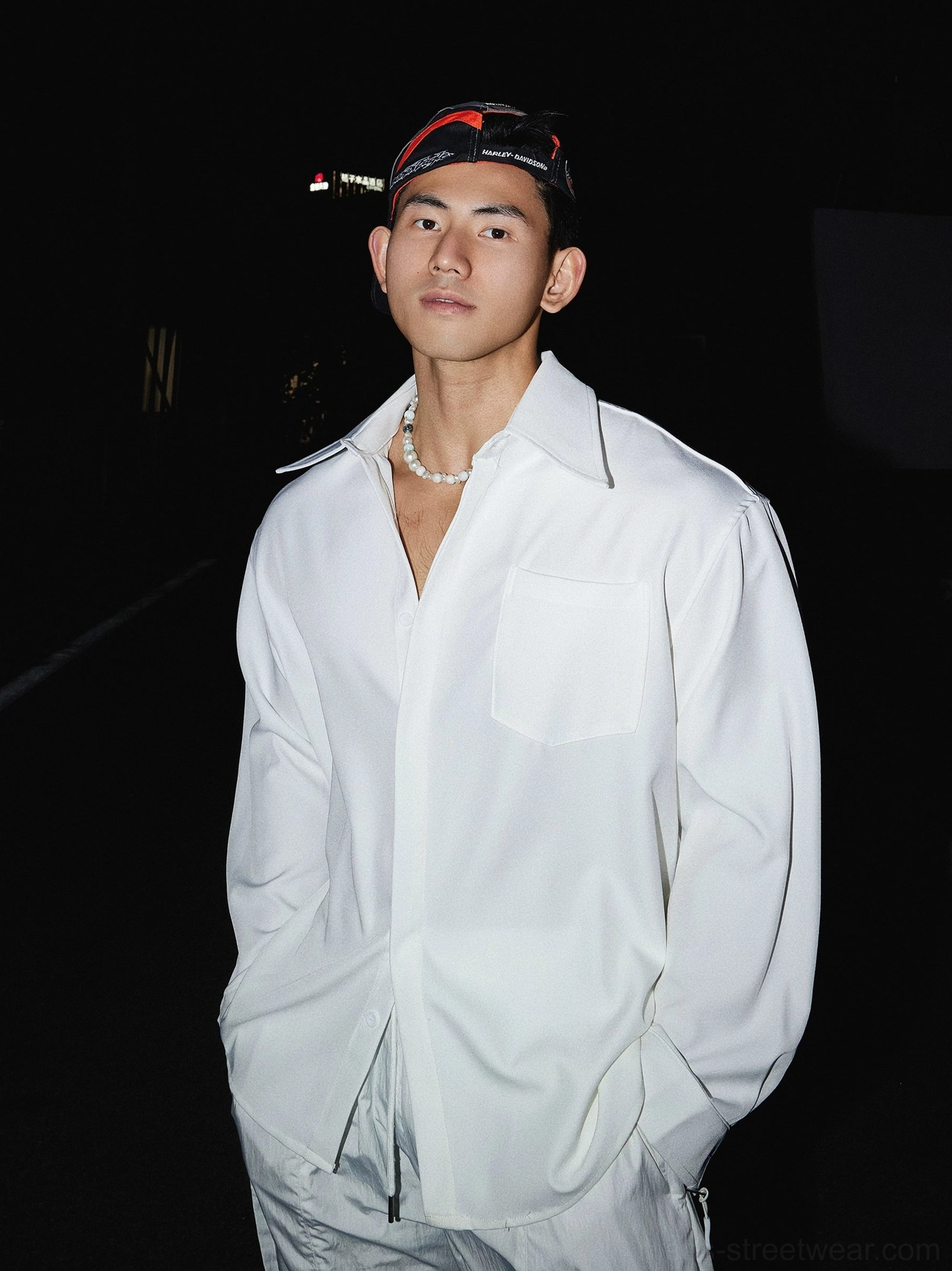 White oversized men's Korean streetwear dress shirt with pointed collar chest pocket and relaxed urban styling