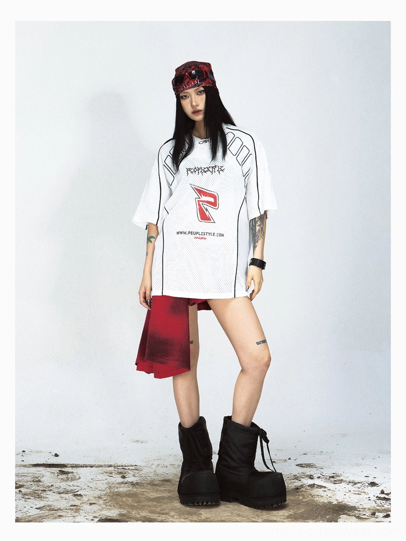 White oversized mesh logo T-shirt styled with chunky platform combat boots, bold red P graphic, and Y2K grunge streetwear attitude