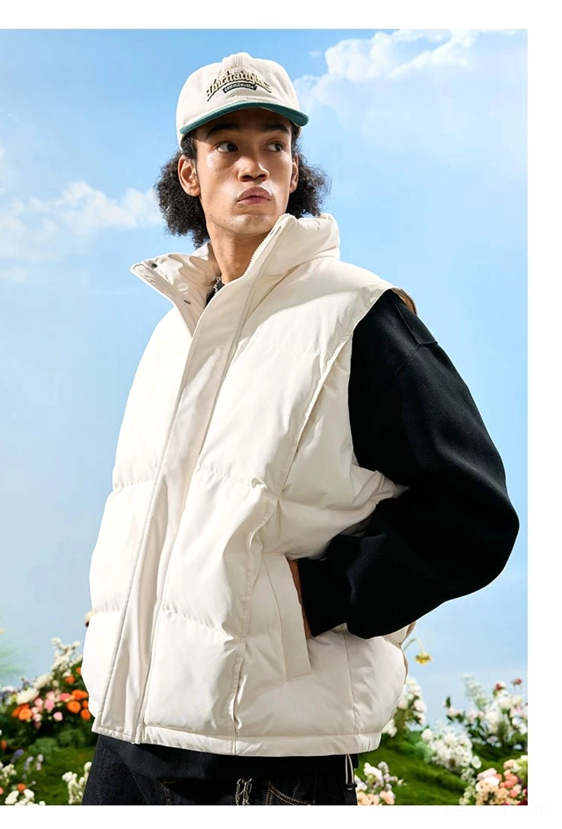 White oversized puffer vest with hidden front zipper, relaxed fit, high collar, and minimalist Korean streetwear styling