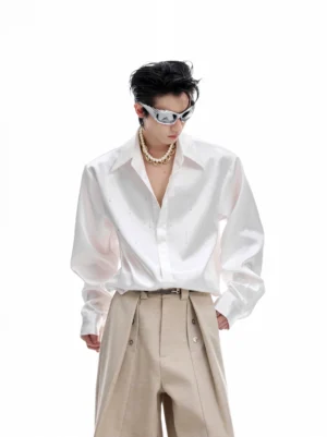 White rhinestone satin oversized party shirt for men shown from the front with relaxed long sleeves and subtle sparkling embellishments