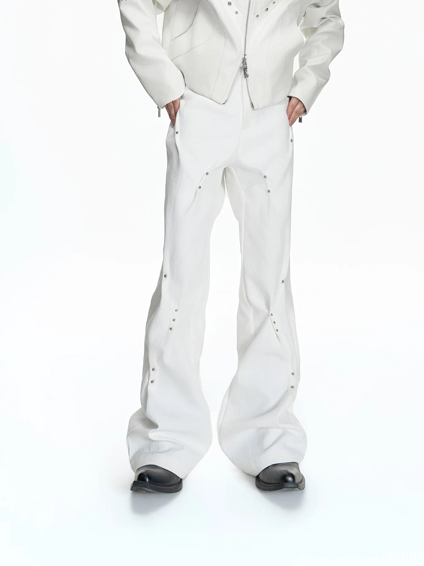 White rivet sculpt flare denim pants front full body view styled with cropped white jacket and leather shoes