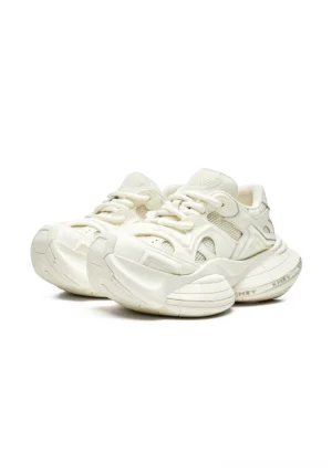 White sculpted-sole chunky sneakers shown in a clean side-by-side view with breathable mesh panels, curved leather overlays, tonal laces, and a thick futuristic EVA outsole