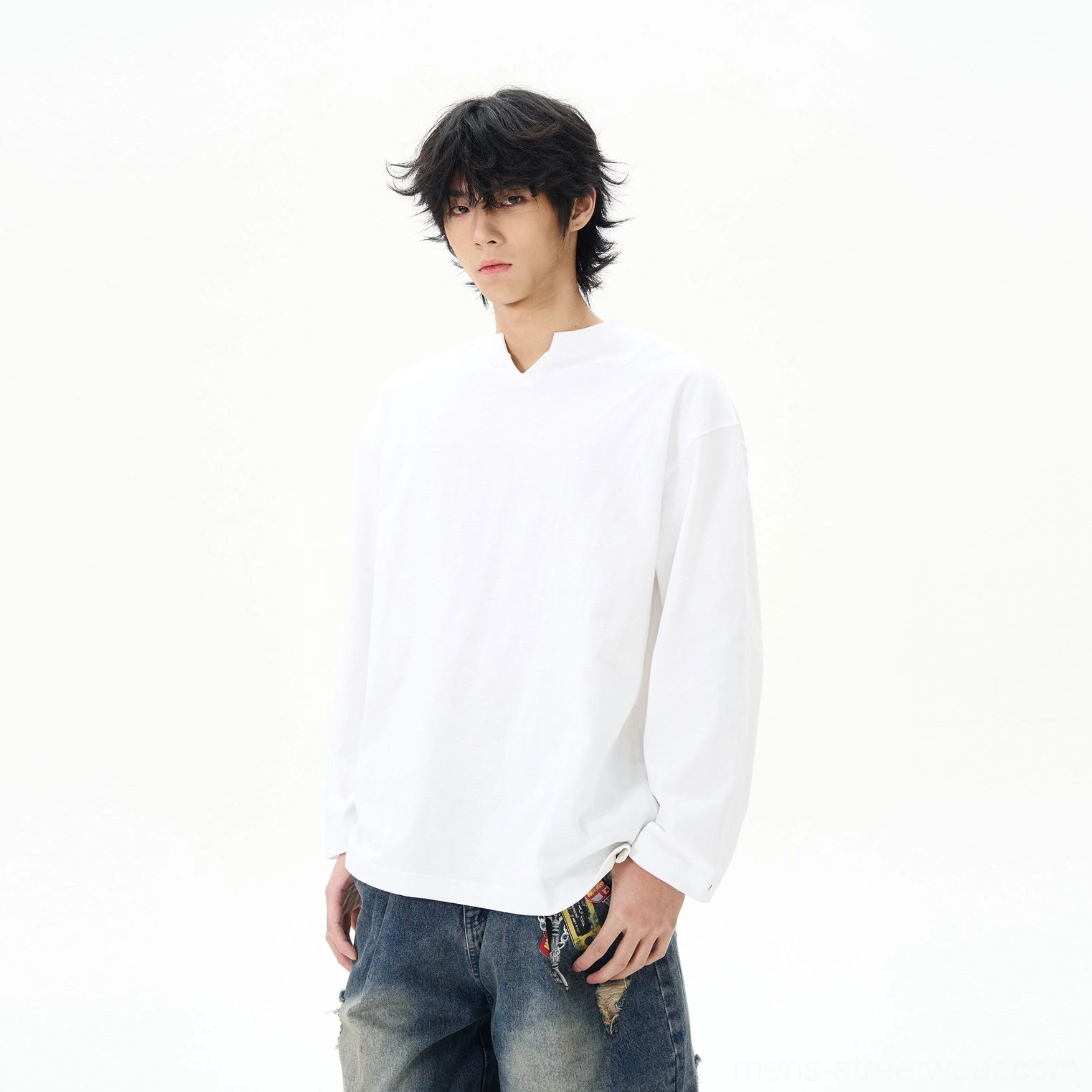 White split-neck cotton long-sleeve streetwear shirt product view with a relaxed fit and minimalist Seoul fashion design