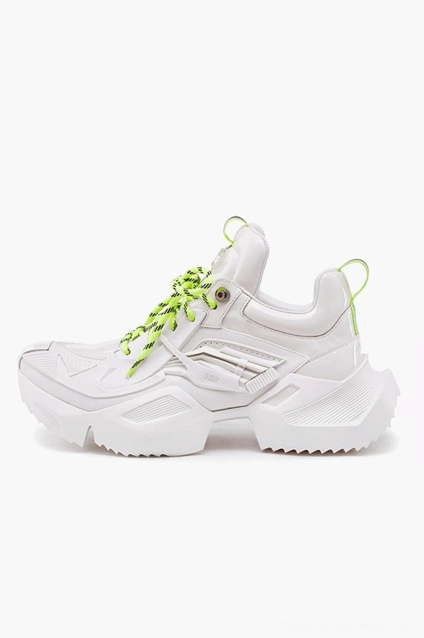 White tactical platform hiking sneaker with neon green laces, bright heel pull tab, layered panels, and chunky techwear outsole