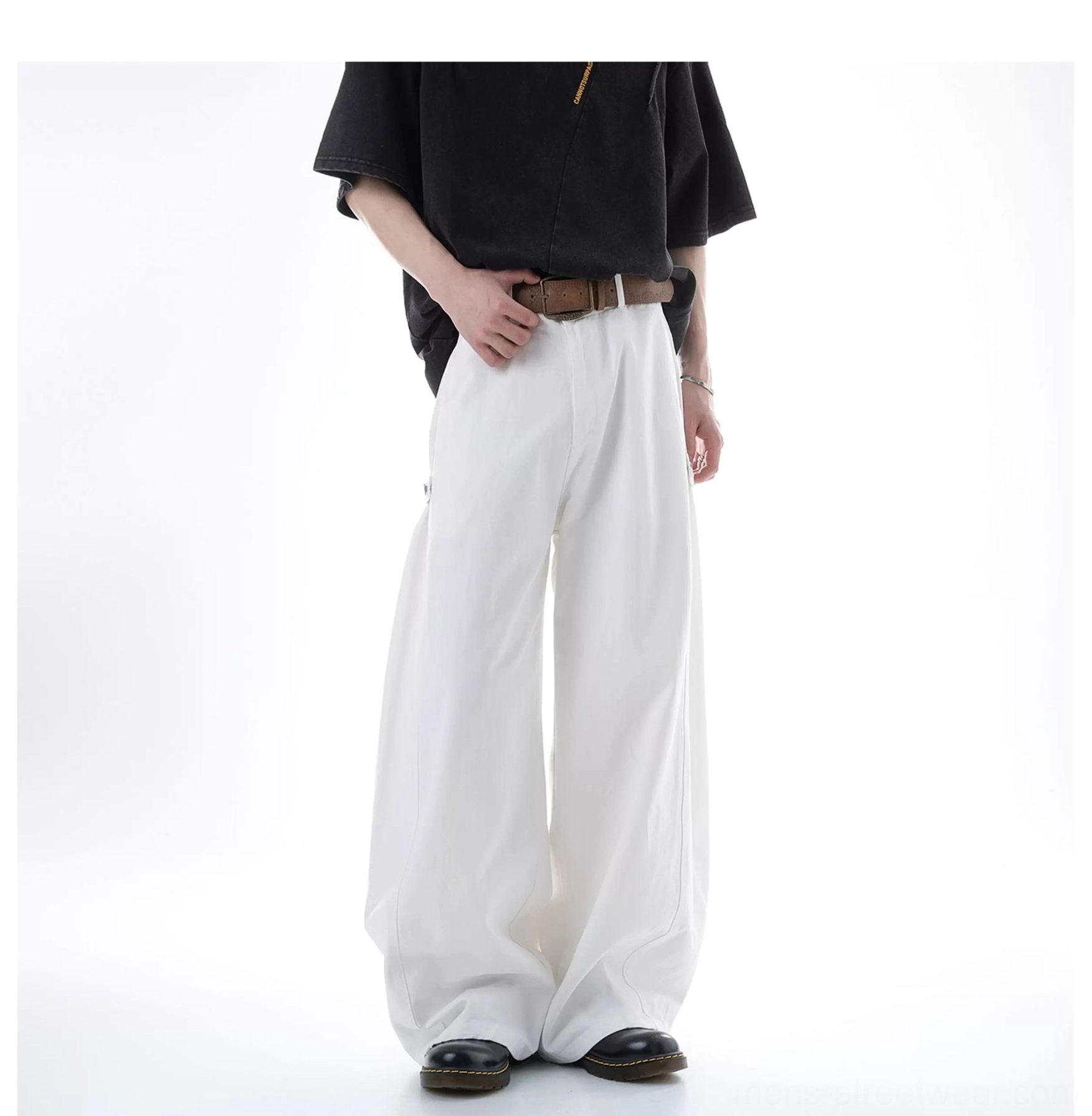 White ultra wide-leg streetwear cargo pants shown in a front full-body studio view with a streamlined silhouette, neat cotton drape, wide legs, and minimalist styling