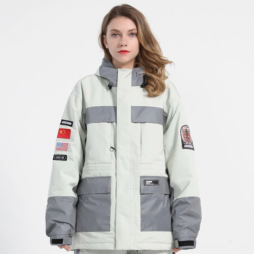 White unisex reflective ski jacket full front view showing color block gray panels, adjustable hood, front pockets and sleeve patches