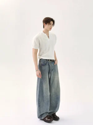 White V-neck knit T-shirt for men styled with loose wide-leg denim in Seoul streetwear outfit