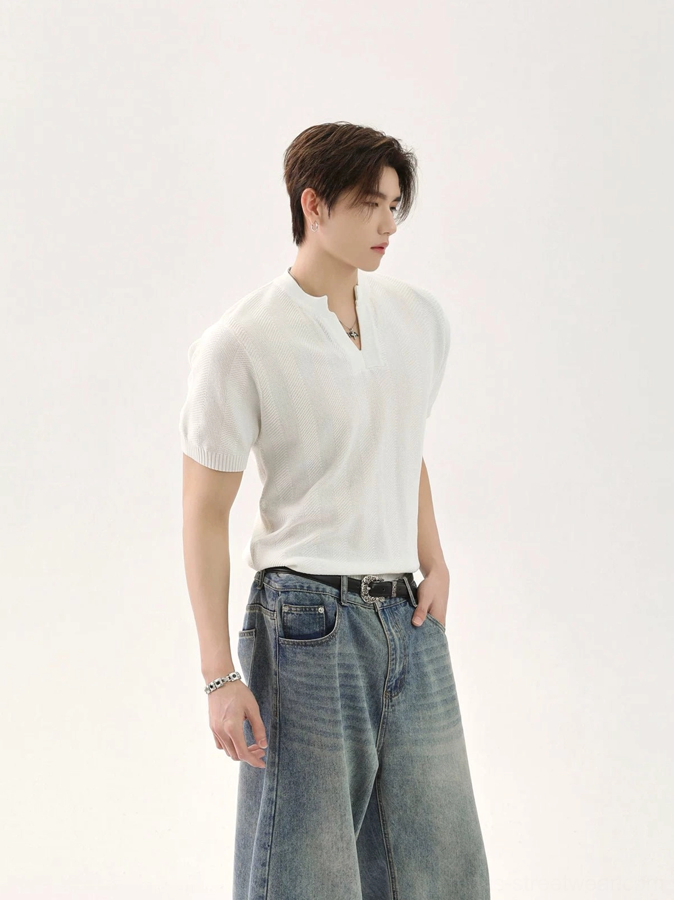 White V-neck short-sleeve knit T-shirt for men in clean everyday Seoul fashion styling