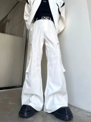 White wide-leg cargo trousers shown from the front with oversized side flap pockets, high-rise waist, black belt, and platform boots for a Korean streetwear look