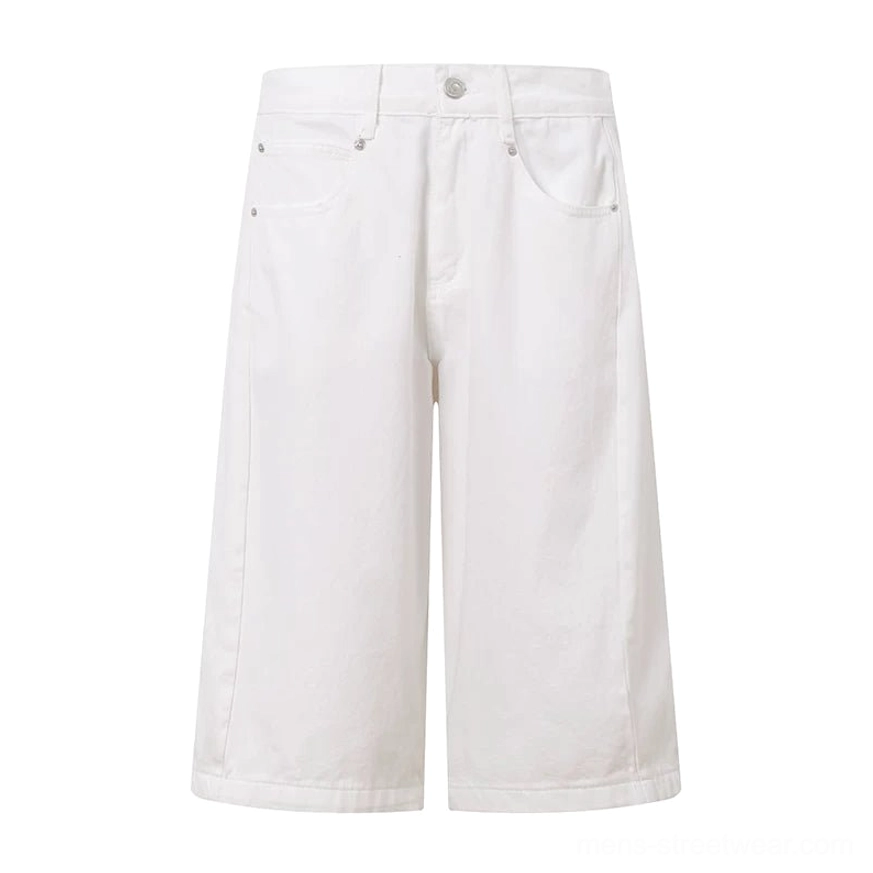 White wide-leg denim Bermuda shorts displayed flat from the front with classic jean pockets and low-rise waist