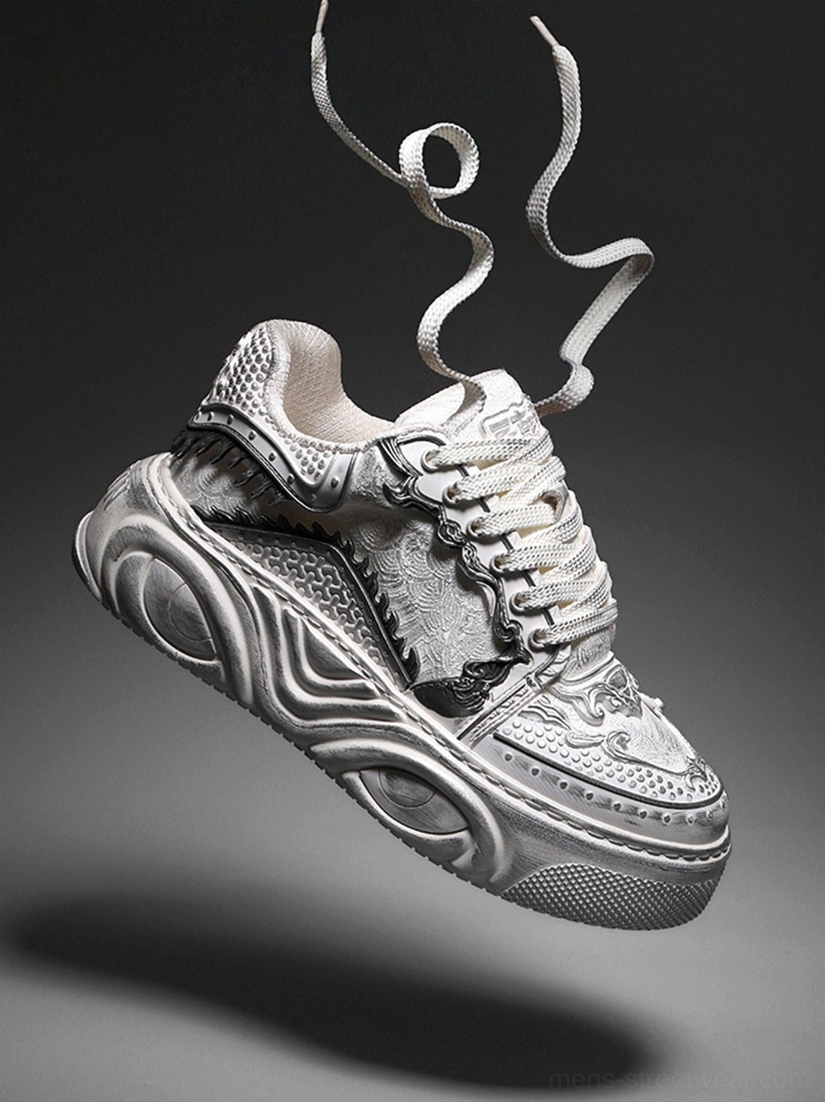 Side angled close-up of white Wukong-inspired platform sneakers showing relief panels, decorative upper details, and thick platform sole