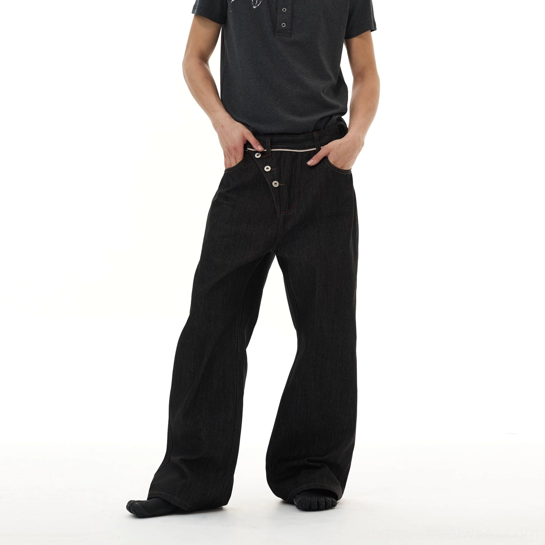Wide-leg asymmetric button denim jeans product image in a dark streetwear-inspired silhouette for modern Korean fashion