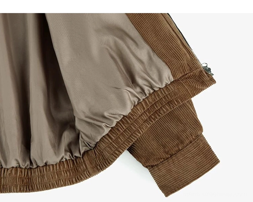 Wide-wale corduroy Harrington jacket detail showcasing heritage outerwear texture and relaxed oversized streetwear fit
