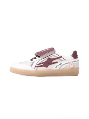 Wine red strap retro sneakers shown in side profile with a white upper, red wine overlays, layered tongue strap, and brown gum rubber sole