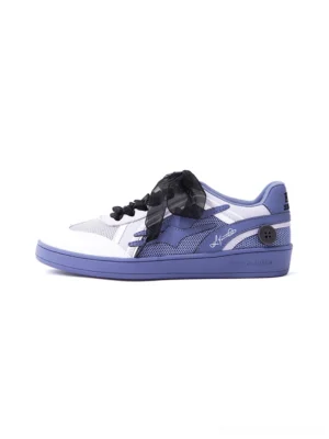 Wisteria lavender purple and white retro court sneaker with oversized black bow laces right side profile