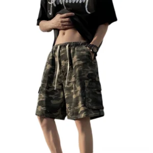 Men's woodland camo drawstring cargo shorts shown in a low-angle front detail view with elastic waist and flap pockets