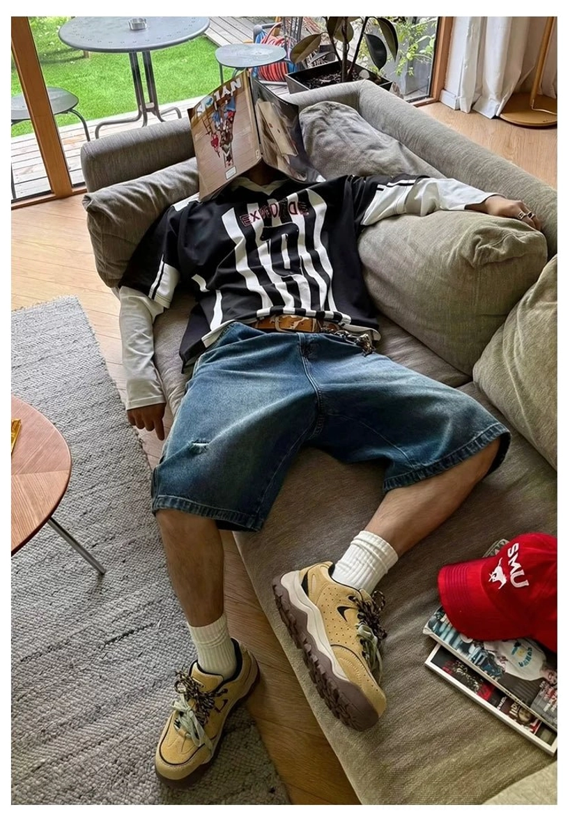 Yellow and beige Terrain Crest chunky trail sneakers styled in a relaxed casual outfit at home, showing the versatile everyday streetwear silhouette