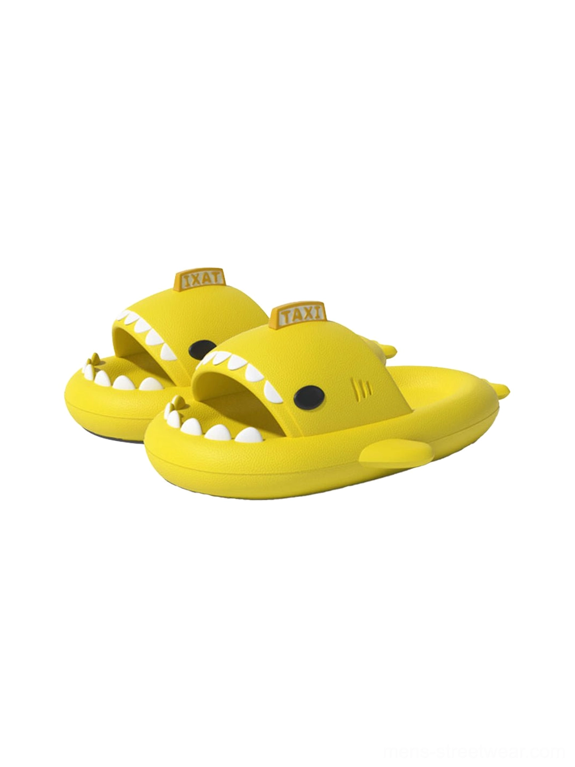 Pair of bright yellow shark platform slippers with open-mouth design and TAXI sign novelty decoration