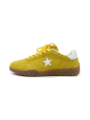 Yellow star embroidered suede-textured streetwear trainers shown from a front overhead angle with white side star, white heel cap, yellow laces, and gum rubber outsole